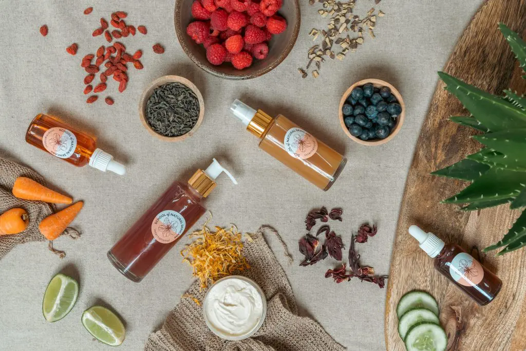 Natural skincare products with fruits and herbs.