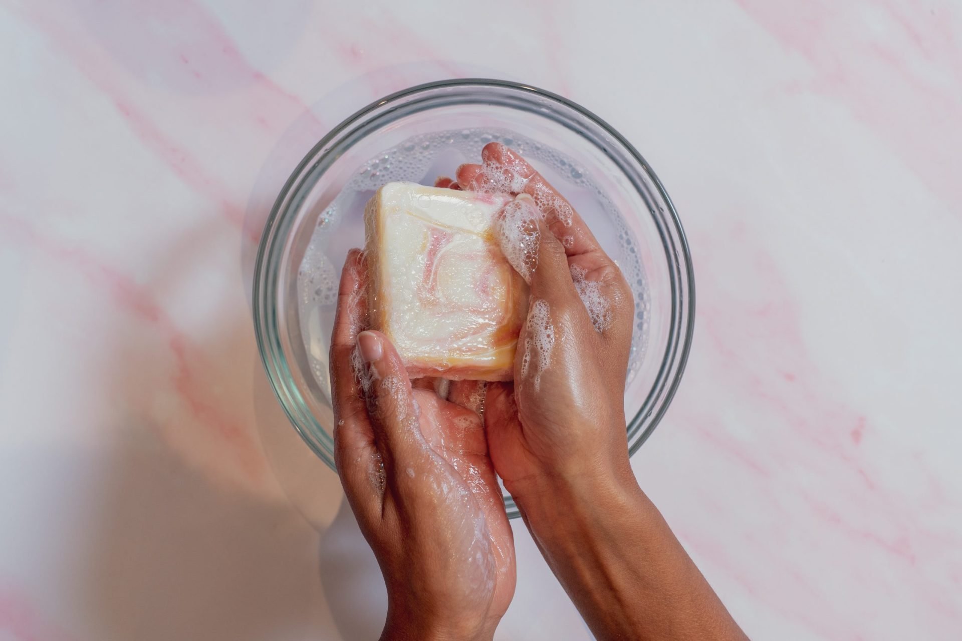 lathering-soap-with-swirls Hands washing a bar of soap